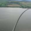 An oblique aerial view of the Cromarty Bridge  crossing the Cromarty Firth to Ardulie , looking N.
