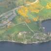 An oblique aerial view of Urquhart Castle, Loch Ness, looking NNW.