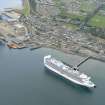 Near aerial view of a cruise ship at East pier, Invergordon, Cromarty Firth, looking N.