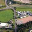 Oblique aerial view of Inverness Royal Academy, looking S.