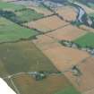 An oblique aerial view over Balblair with the river Beauly and the Lovat bridge, S of Beauly, looking E.