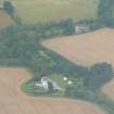 An oblique distant aerial view of Phoineas House, near Beauly, looking NE.