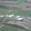 An aerial oblique view of the industrial estate Muir of Ord, Black Isle, looking E.