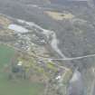 Oblique aerial view of Orrin Bridge and the lower part of the river Orrin, Easter Ross, looking SW.