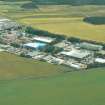 Aerial view of Dalcross Industrial Estate, E of Inverness, looking E.