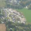 Aerial view of W end of village, Kirkhill, near Beauly, looking SE.