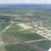 Aerial view of Kinloss, former RAF airfield, Moray, looking E.