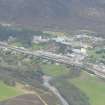 Aerial view of Aviemore, railway and river Spey, Strathspey, looking W.