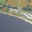 Close up aerial view of Lochend village, on Loch Ness, looking NW.