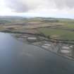 Aerial view of Nigg oil terminal with Hill of Nigg in background, Cromarty Firth, looking NE.