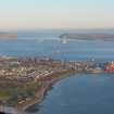 Aerial view of Invergordon with harbour and fuel tanks visible, Cromarty Firth, looking NE.