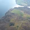Aerial view of Torr an Daimh prehistoric settlement, Loch Duntelchaig, S of Inverness, looking S.