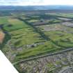 Aerial view of Loch Ness Golf Course and Fairways Driving Range, looking SE.