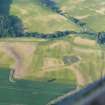 Aerial view of Tarradale Enclosure/ Fort, Enclosure and Barrow cemetery cropmarks, Black Isle, looking NE.