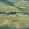 Aerial view of Tarradale Fort/ Enclosure and Barrow cemetery cropmarks, Muir of Ord, Black Isle, looking NE.