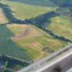 Aerial view of Tarradale barrow field and surrounding fields with cropmarks, Muir of Ord, Black Isle, looking NNE.