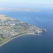 An oblique aerial view of Invergordon, Easter Ross, looking E.