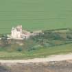 Aerial view of Ballone Castle as restored, Tarbat Ness, Easter Ross, looking NW.