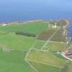 Aerial view of Wilkhaven slipway/pier and harbour and Tarbat Ness Lighthouse, Easter Ross, looking NNE.