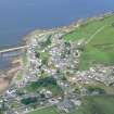 Aerial view of Portmahomack village and harbour E end, Tarbat Ness, Easter Ross, looking N.