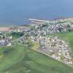 Aerial view of Portmahomack village and harbour E end, Tarbat Ness, Easter Ross, looking NW.