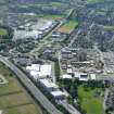 Aerial view of Raigmore Hospital and Beechwood Business Park, with Inshes Retail Park beyond, Inverness, looking S.