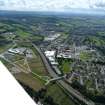 Oblique aerial view of the Beechwood campus, Raigmore Hospital and Inshes Retail Park, Inverness, looking S.