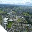 Aerial view of Raigmore Hospital and Beechwood Business Park, with Inshes Retail Park beyond, Inverness, looking S.