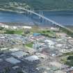 Oblique aerial View of the Longman Industrial Estate and Kessock Bridge, Inverness, looking NW.