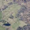 An oblique aerial view of fields N or Breakachy Farm, Kilmorack, looking SW.