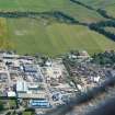 Near aerial view of Baxters, Tomich and Windhill Industrial Estates, Muir of Ord, Black Isle, looking SE.