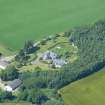 Near vertical aerial view of houses near Urquhart Old Parish Burial Ground, Black Isle, looking N.