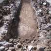 Evaluation Photograph, Trench 4 showing cobble floor, facing SE, 8-20 King's Stables Road, Edinburgh