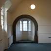 Evaluation Photograph, Room 1- view of archway and bay window in NE interior wall, facing NW, Old Coates House