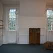 Evaluation Photograph, Room 1- view of NE interior wall showing sash and case windows and timber cladding, facing NE, Old Coates House