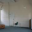 Evaluation Photograph, Room 1- view of SE interior wall showing timber cladding, facing E, Old Coates House