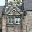 Evaluation Photograph, Old Coates House- SW facing elevation- Phase 2- detail of entrance and reclaimed date stone, facing NE, Old Coates House