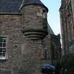 Evaluation Photograph, Old Coates House- Detail of bartisan and gun loop at SE corner of building with St Mary's Cathedral in background, facing E, Old Coates House