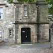 Evaluation Photograph, NE facing elevation- Phase 3 ground floor entrance, facing SW, Old Coates House