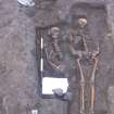 Archaeological excavation, Skeleton 112, 115 with board etc., Auldhame, East Lothian