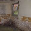 The SW corner on the ground floor with one of the two windows lighting the compartment in the NW wall