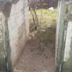 The partly blocked entrance leading into the gun pit of the NE Emplacement