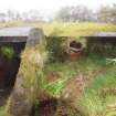 Balnakailly: The ceramic ventilation pipe to the ESE of the entrance (connected to the vent in the SSW wall of the generator compartment), which conveyed gasses through the earthen blast wall 