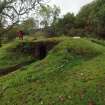 Rhobodach:  The air raid shelter from the NNE (Allan Kilpatrick surveying the SE corner of the roof)