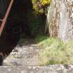 W Emplacement: View of the stairs leading down to the basement from the E