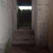 The steps and doorway leading into the observation post from the corridor on the NNE side of the building 