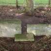 A plinth for a timber post on the N side of a barracks