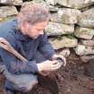 Trial trench, One of the finds in context 002, Blachouse F, St Kilda