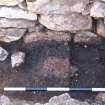 Trial trench, SW corner of blackhouse: area of ash context 003/004 with 005 below, Blachouse F, St Kilda