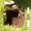 Graveyard survey, Figure 9d, Excavation of hole for internment, mid-excavation, St Kilda